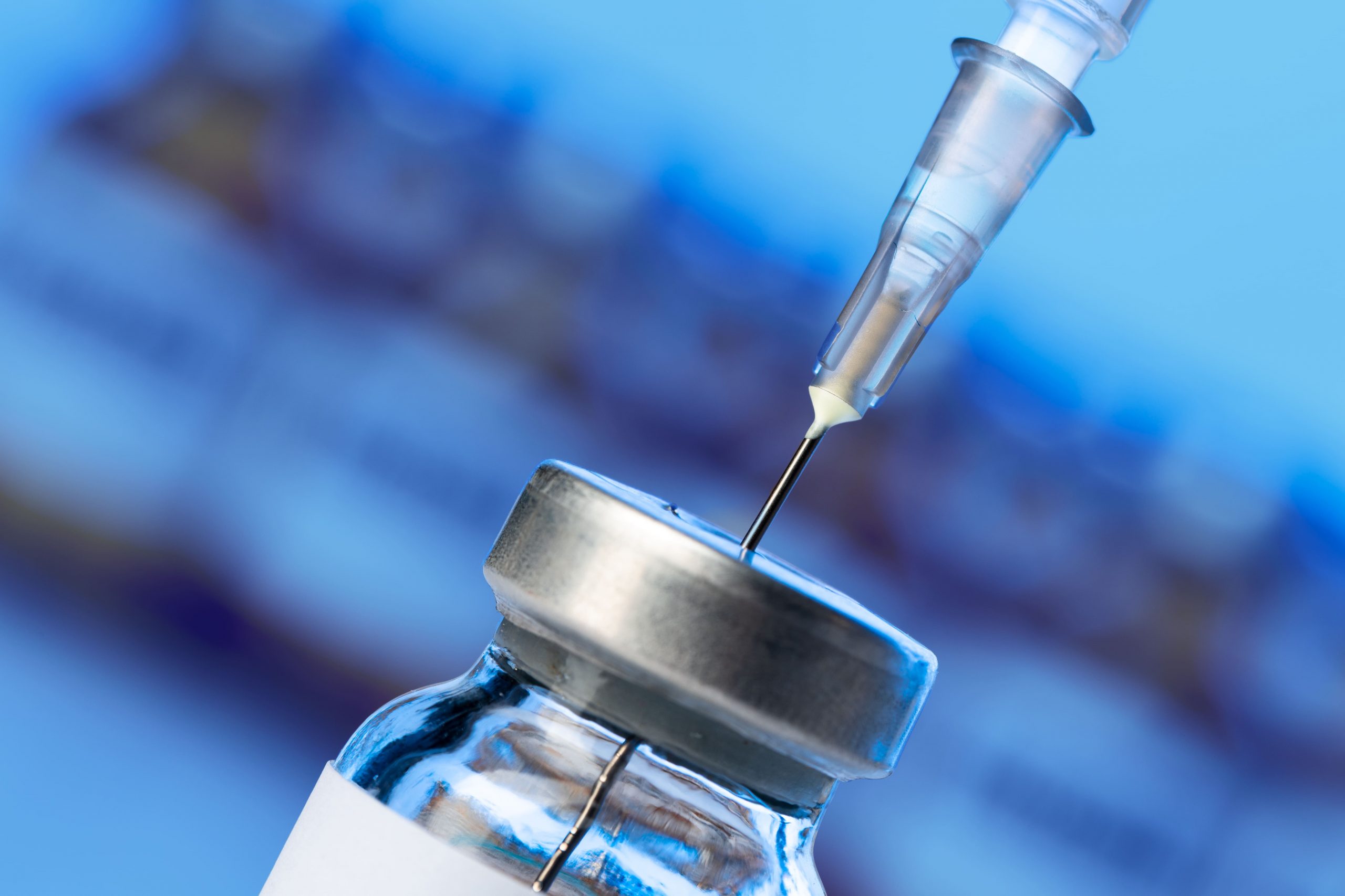 vaccine-bottle-with-a-syringe-taking-the-vaccine-f-2021-09-03-05-55-59-utc (1)