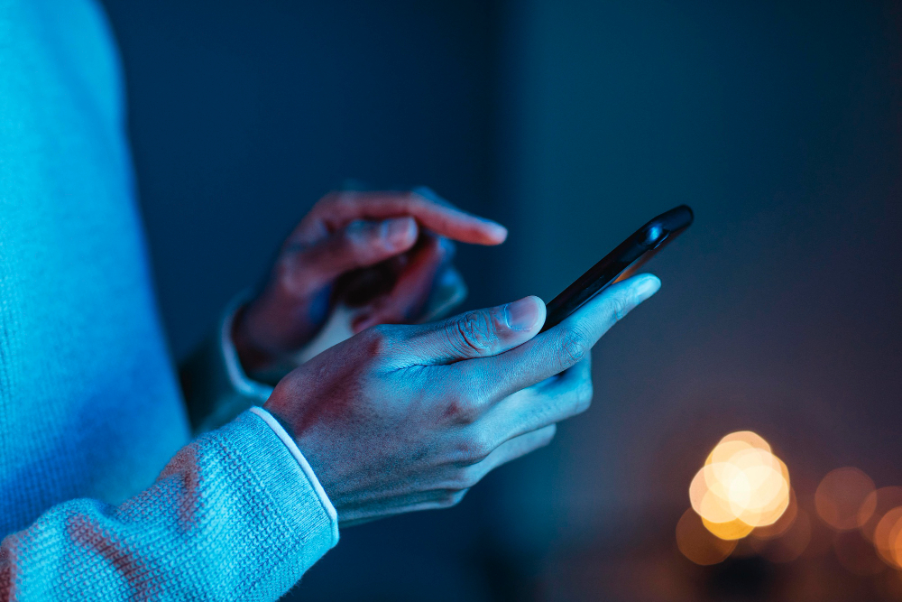 side-view-of-man-using-smartphone-1