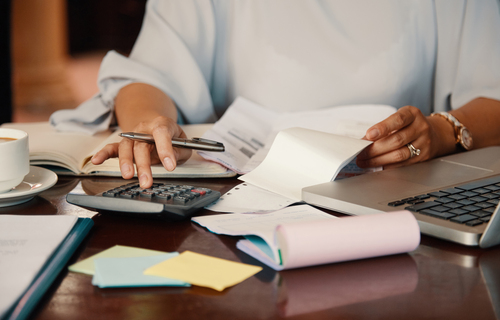 Entrepreneur working with bills